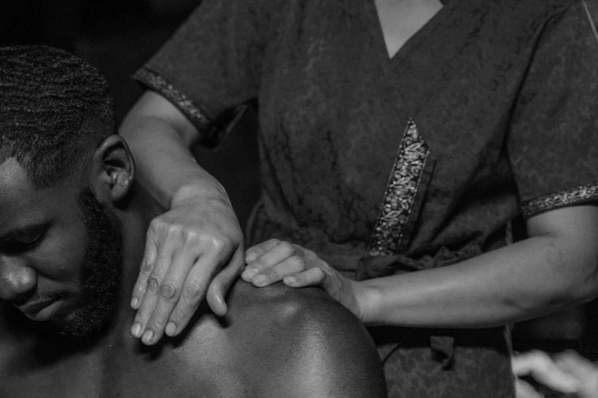 Hands-on Active Release Technique soft tissue therapy on a patient's shoulder