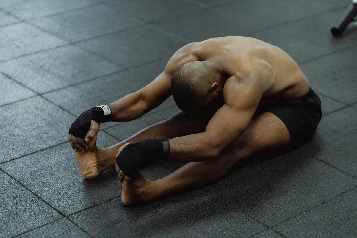 Athlete performing a mobility and stretching exercise